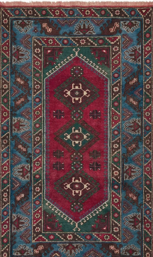 Authentic Anatolian rug with geometric pattern in red, blue, and brown