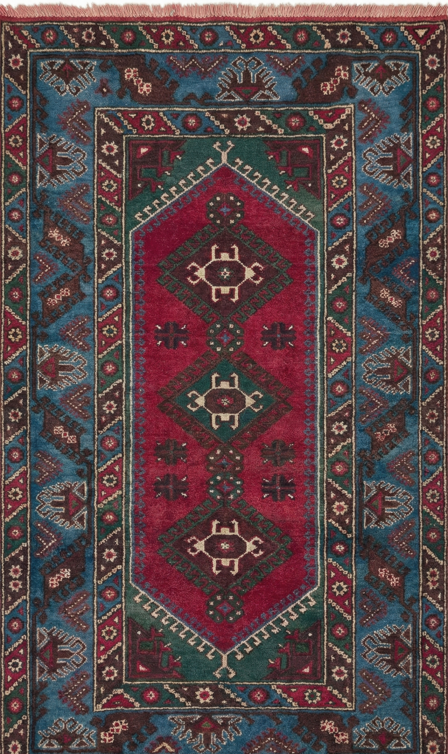 Authentic Anatolian rug with geometric pattern in red, blue, and brown