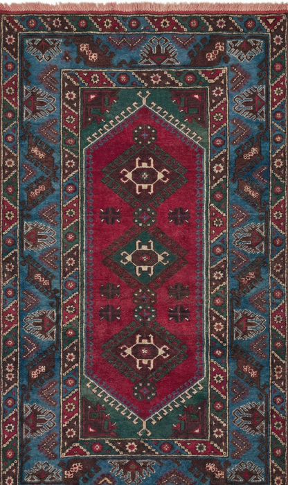 Authentic Anatolian rug with geometric pattern in red, blue, and brown