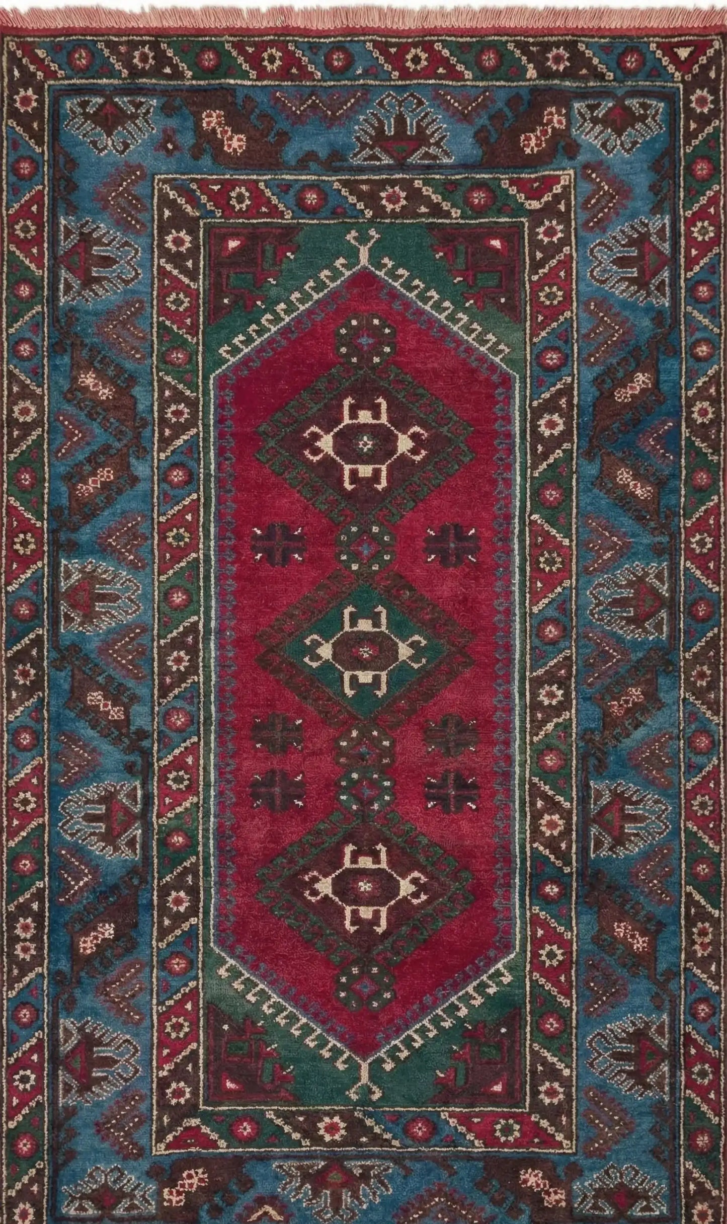 Authentic Anatolian rug with geometric pattern in red, blue, and brown