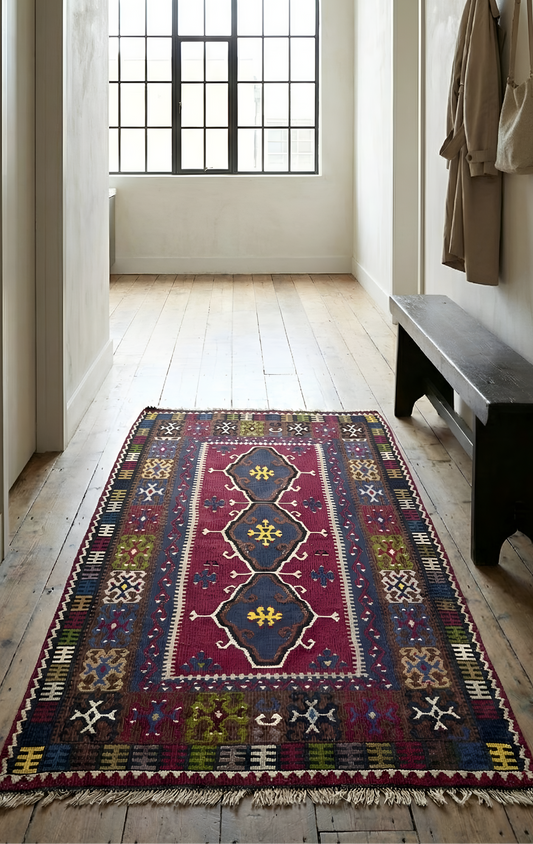 70 years Anatolian wool rug styled in Amsterdam loft hallway