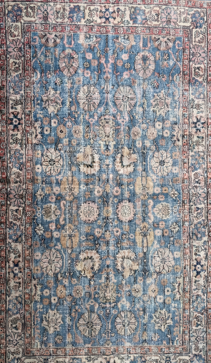 Anatolian wool rug with intricate pattern in blue, beige, and light brown