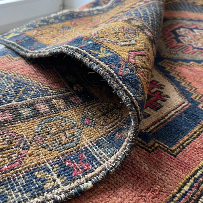 Close-up of an Anatolian rug with a focus on the texture and colors