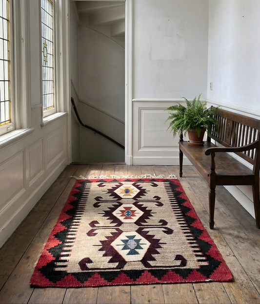 Vintage anatolian 100% wool, natural dye rug  with geometric pattern on wooden floor