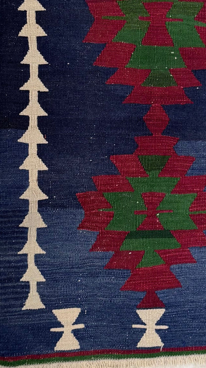 Close-up of a patterned Anatolian kilim rug with geometric designs