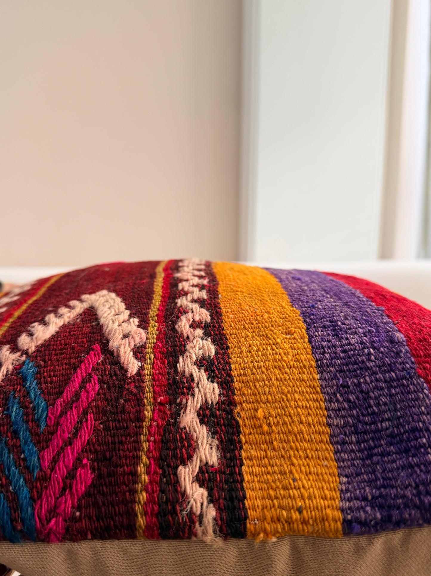 High-quality Turkish kilim pillow cover with bold stripes in mustard yellow, burgundy, and plum hand-spun wool