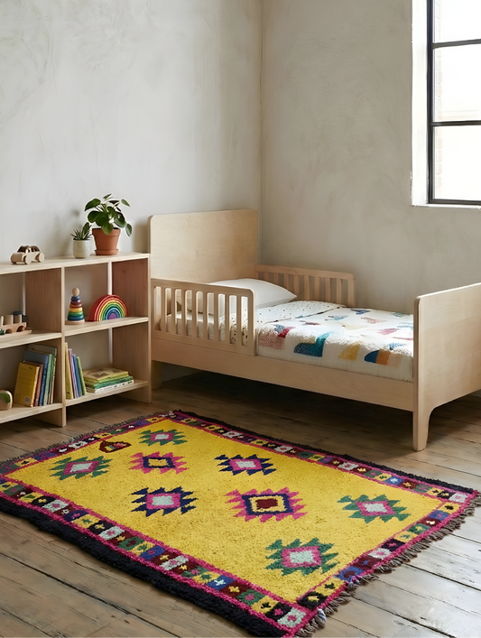 40 years old wool Vibrant yellow Anatolia rug in a Scandi-Boho kids' bedroom
