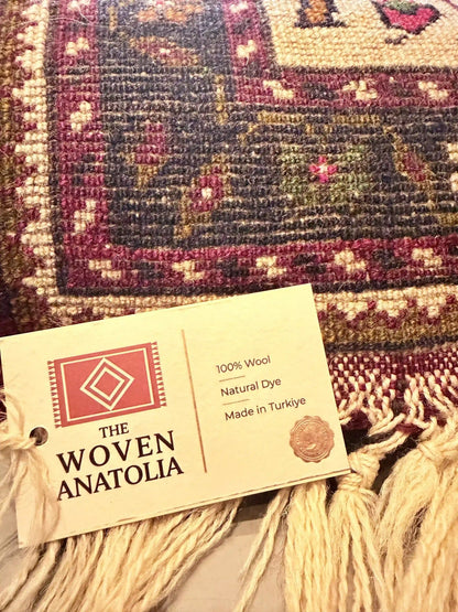 Woven Anatolia label on a textured fabric background