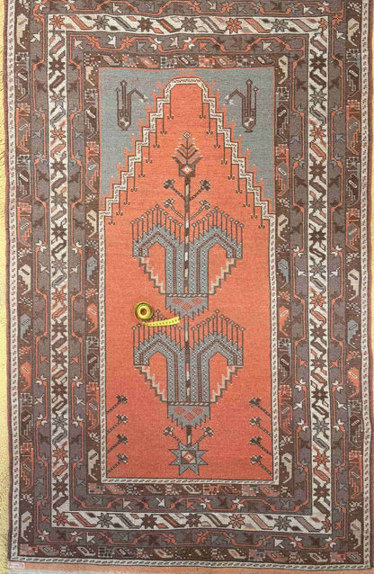 Overhead of a hand-knotted authentic Turkish rug, oriental, natural dye and wool